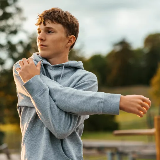 Teen Crohn's disease patient staying active outdoors