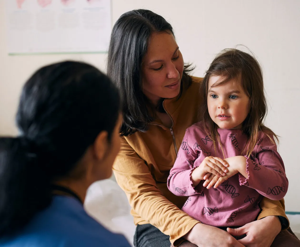Pediatric ulcerative colitis patient and parent at a clinic visit